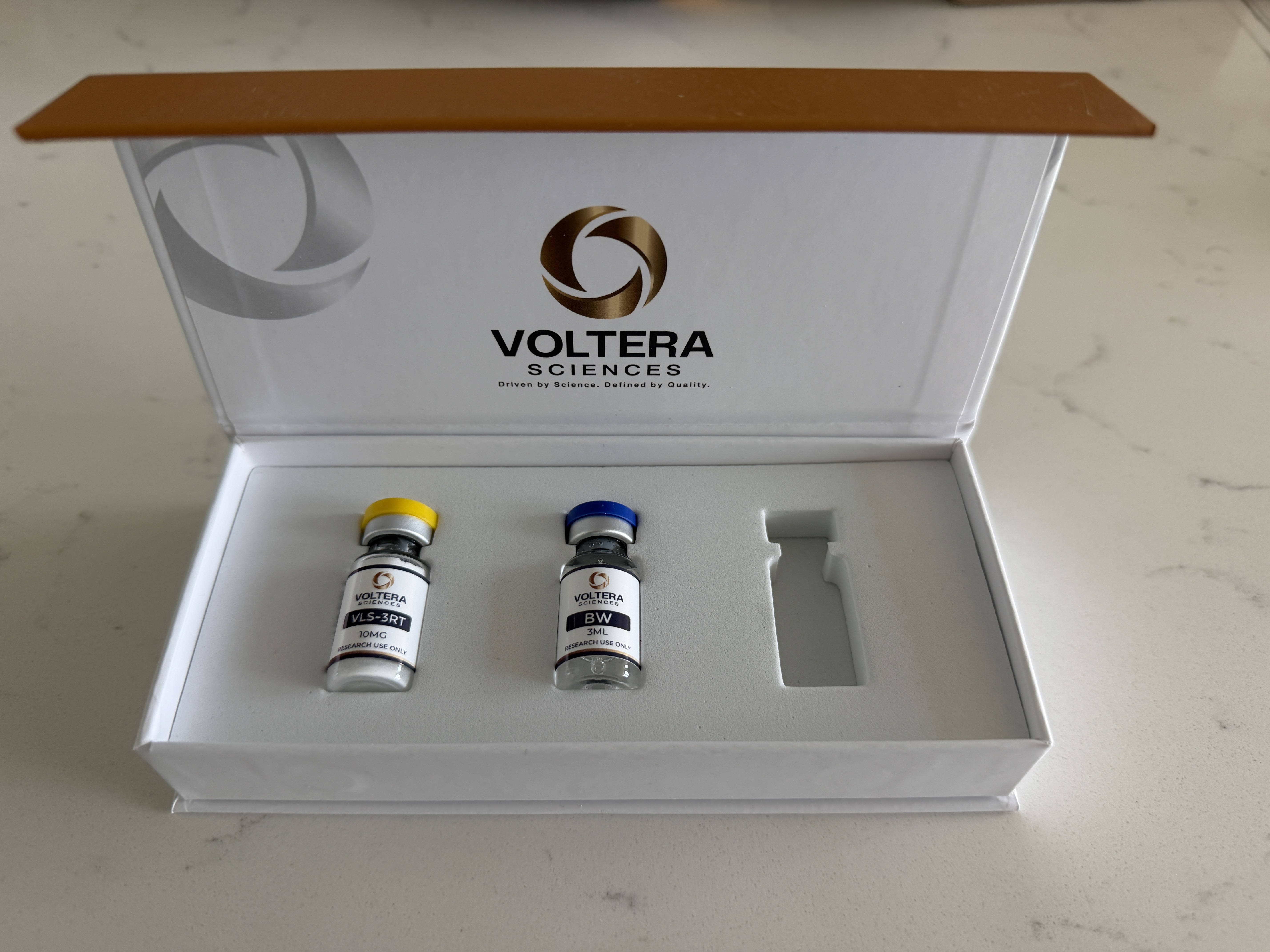 Voltera Sciences review package opened with the product vial and included BAC water